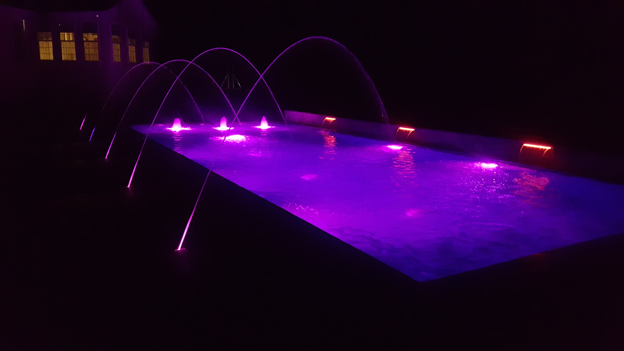 Crystal clear swimming pool with blue water