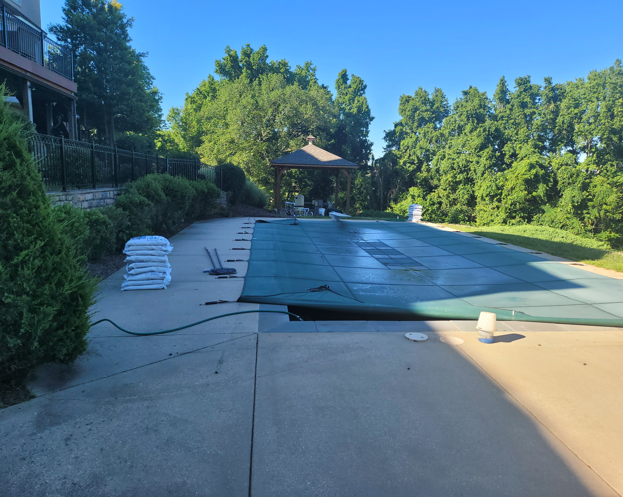 Winter safety cover installed on residential pool by AquaPros