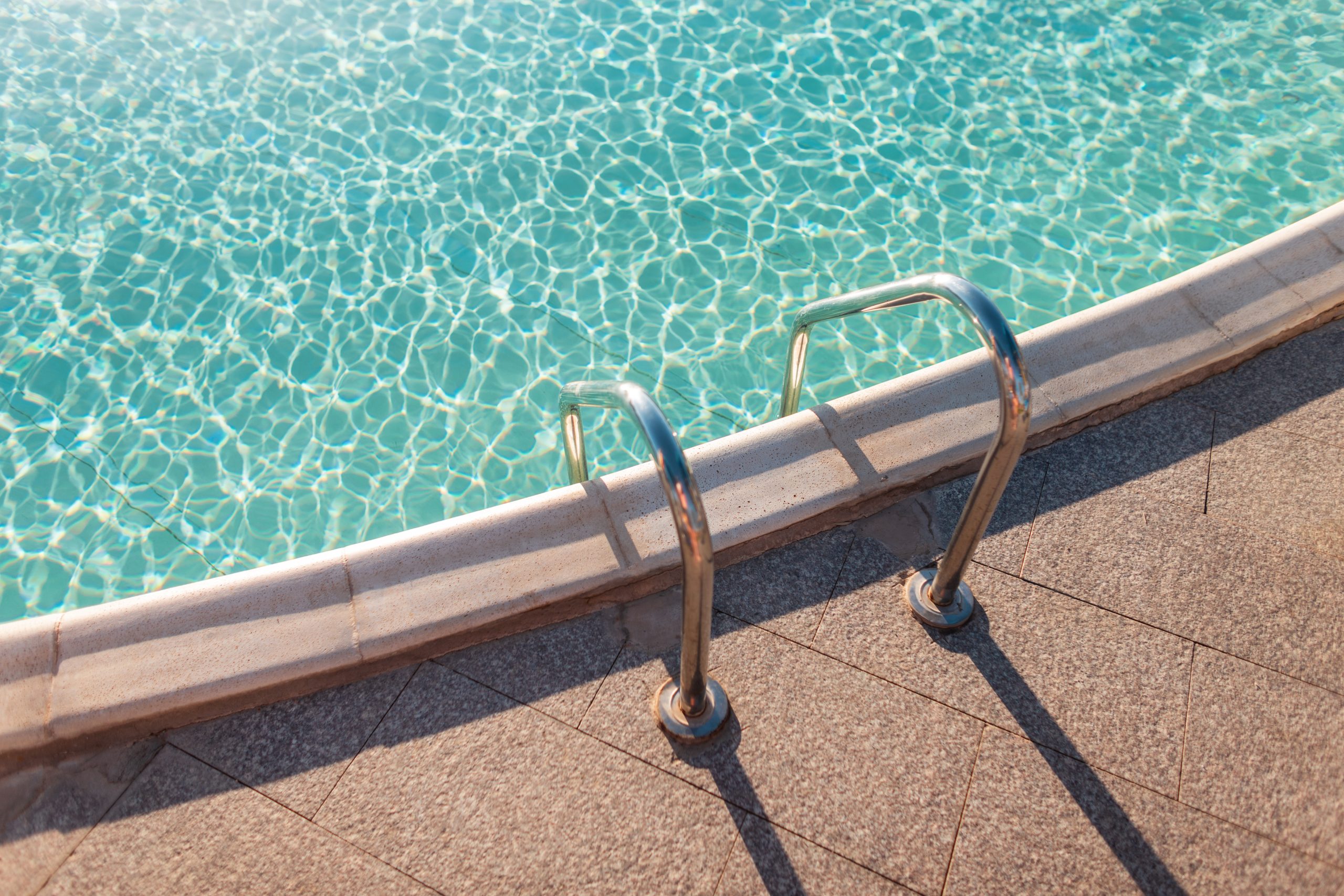 AquaPros technician servicing a pool